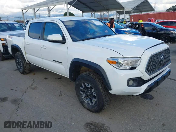 ✅ 2023 Toyota Tacoma TRD Sport • VIN: 3TMCZ5AN0PM604214 • Лот: 44094230. Опубліковано раніше на IAAI з пробігом 95 421 миль. Безкоштовний доступ до архіву аукціонних продажів зі США та докладний звіт про історію автомобіля на DreamBid. Зображення 1.