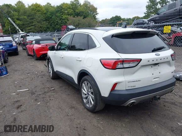 ✅ 2022 Ford Escape Titanium Hybrid • VIN: 1FMCU9DZ0NUA38399 • Lot: 43224749. Listed on IAAI with 45,688 mi. Free auction sales archive from the USA and detailed vehicle history report at DreamBid. Image 3.