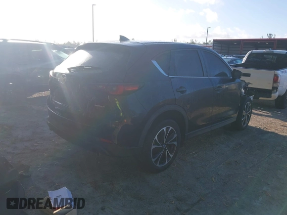✅ 2022 Mazda CX-5 S Premium • VIN: JM3KFBDM2N1625329 • Lot: 44493993. Wystawiony na IAAI z przebiegiem 51 801 mil. Bezpłatny archiwum sprzedaży aukcyjnych z USA i szczegółowy raport historii pojazdu na DreamBid. Zdjęcie 4.