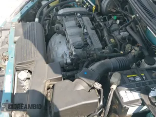 ✅ 2002 Mazda Protege DX • VIN: JM1BJ225120524478 • Lot: 42752160. Listed on IAAI with 193,561 mi. Free auction sales archive from the USA and detailed vehicle history report at DreamBid. Image 12.