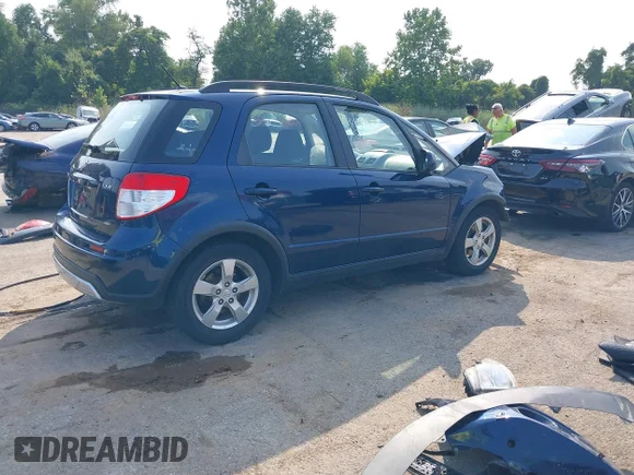 ✅ 2011 Suzuki SX4 Crossover • VIN: JS2YB5A38B6301589 • Lot: 40112766. Listed on IAAI with 128,323 mi. Free auction sales archive from the USA and detailed vehicle history report at DreamBid. Image 4.