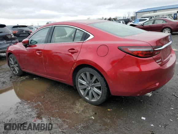 ✅ 2019 Mazda 6 Touring • VIN: JM1GL1VM3K1500898 • Лот: 36767493. Опубликован ранее на Copart с пробегом 49 011 миль. Бесплатный доступ к архиву аукционных продаж из США и подробный отчёт об истории автомобиля на DreamBid. Изображение 2.