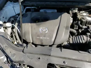 ✅ 2021 Mazda CX-5 Grand Touring • VIN: JM3KFADM0M0470035 • Lot: 87051675. Wystawiony na Copart z przebiegiem 127 210 mil. Bezpłatny archiwum sprzedaży aukcyjnych z USA i szczegółowy raport historii pojazdu na DreamBid. Zdjęcie 15.