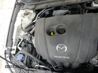 ✅ 2021 Mazda 3 Select • VIN: JM1BPBBL9M1336074 • Лот: 65606255. Опубликован ранее на Copart с пробегом 9 999 миль. Бесплатный доступ к архиву аукционных продаж из США и подробный отчёт об истории автомобиля на DreamBid. Изображение 13.