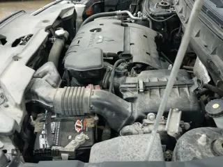 ✅ 2015 Mitsubishi Outlander GT • VIN: 4A4AR4AW0FE046601 • Lot: 43673009. Listed on IAAI with 107,239 mi. Free auction sales archive from the USA and detailed vehicle history report at DreamBid. Image 19.