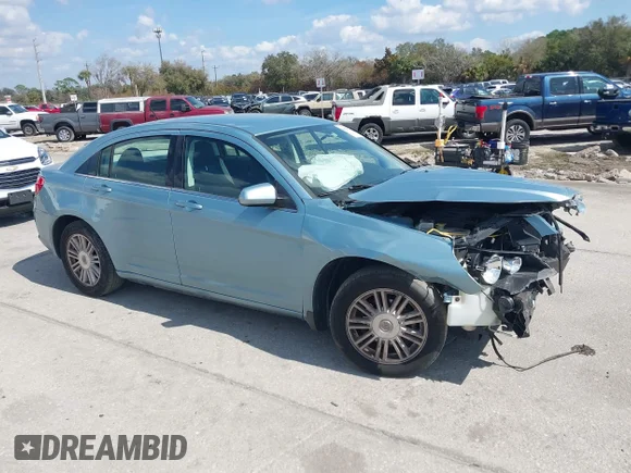 ✅ 2009 Chrysler Sebring Touring • VIN: 1C3LC56B79N563237 • Lot: 44420718. Listed on IAAI with 115,397 mi. Free auction sales archive from the USA and detailed vehicle history report at DreamBid. Image 1.