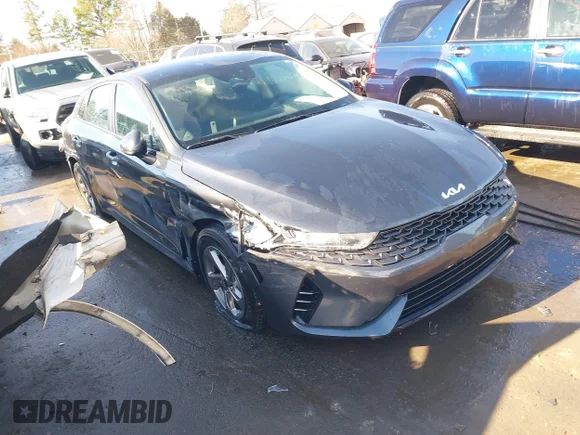 ✅ 2022 Kia K5 LXS • VIN: 5XXG14J24NG148726 • Лот: 41663875. Опубликован ранее на IAAI с пробегом 22 883 миль. Бесплатный доступ к архиву аукционных продаж из США и подробный отчёт об истории автомобиля на DreamBid. Изображение 1.
