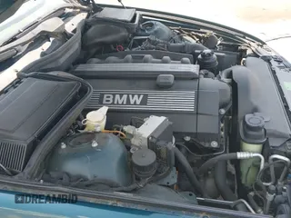 ✅ 1997 BMW 5 Series 528i • VIN: WBADD6328VBW00067 • Lot: 42577824. Listed on IAAI with 122,332 mi. Free auction sales archive from the USA and detailed vehicle history report at DreamBid. Image 12.