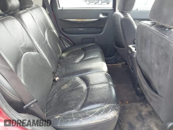 ✅ 2009 Mazda Tribute Touring • VIN: 4F2CZ02759KM01350 • Lot: 43761203. Wystawiony na IAAI z przebiegiem 297 834 mil. Bezpłatny archiwum sprzedaży aukcyjnych z USA i szczegółowy raport historii pojazdu na DreamBid. Zdjęcie 8.