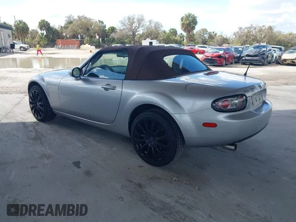 ✅ 2006 Mazda MX-5 Miata Sport • VIN: JM1NC25F560107267 • Lot: 44559943. Wystawiony na IAAI z przebiegiem 157 124 mil. Bezpłatny archiwum sprzedaży aukcyjnych z USA i szczegółowy raport historii pojazdu na DreamBid. Zdjęcie 3.