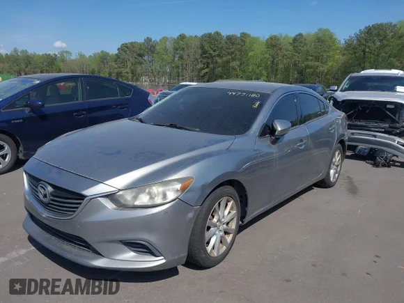 ✅ 2014 Mazda 6 i Sport • VIN: JM1GJ1U59E1101305 • Lot: 44771180. Wystawiony na IAAI z przebiegiem 234 598 mil. Bezpłatny archiwum sprzedaży aukcyjnych z USA i szczegółowy raport historii pojazdu na DreamBid. Zdjęcie 2.