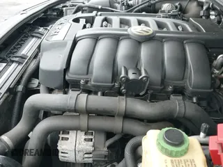 ✅ 2011 Volkswagen Touareg Sport • VIN: WVGFF9BP6BD004651 • Lot: 43443450. Listed on IAAI with 148,111 mi. Free auction sales archive from the USA and detailed vehicle history report at DreamBid. Image 12.