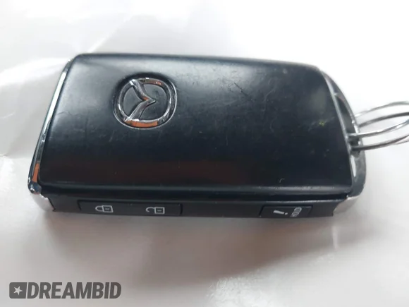 ✅ 2021 Mazda CX-5 Grand Touring • VIN: JM3KFBDMXM1386028 • Lot: 43789857. Listed on IAAI with 112,286 mi. Free auction sales archive from the USA and detailed vehicle history report at DreamBid. Image 11.