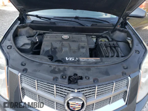 ✅ 2012 Cadillac SRX • VIN: 3GYFNGE35CS640977 • Лот: 75446414. Опубликован ранее на Copart с пробегом 138 397 миль. Бесплатный доступ к архиву аукционных продаж из США и подробный отчёт об истории автомобиля на DreamBid. Изображение 12.