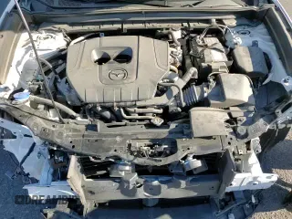 ✅ 2023 Mazda CX-30 S Select • VIN: 3MVDMBBMXPM570224 • Лот: 80828745. Опубликован ранее на Copart с пробегом 24 395 миль. Бесплатный доступ к архиву аукционных продаж из США и подробный отчёт об истории автомобиля на DreamBid. Изображение 14.