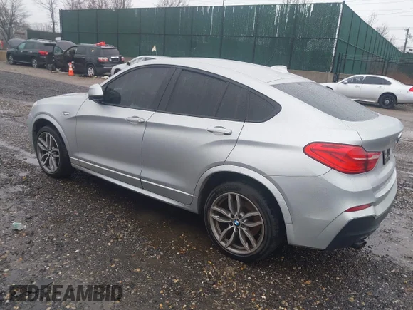 ✅ 2018 BMW X4 M40i • VIN: 5UXXW7C52J0W65284 • Лот: 44665201. Опубліковано раніше на IAAI з пробігом 102 607 миль. Безкоштовний доступ до архіву аукціонних продажів зі США та докладний звіт про історію автомобіля на DreamBid. Зображення 3.