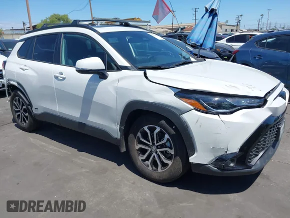 ✅ 2023 Toyota Corolla Cross Hybrid SE • VIN: 7MUFBABGXPV014487 • Lot: 44938004. Wystawiony na IAAI z przebiegiem 14 662 mil. Bezpłatny archiwum sprzedaży aukcyjnych z USA i szczegółowy raport historii pojazdu na DreamBid. Zdjęcie 1.