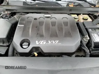 2017 Chevrolet Impala LT z VIN 2G1105S38H9185689, wystawiony jako Copart lot #86317055 z przebiegiem 128 364 mil mil oraz Szkoda całkowita • Salvage title. Historia ofert i sprzedaży dostępna na DreamBid. Obrazek 13.