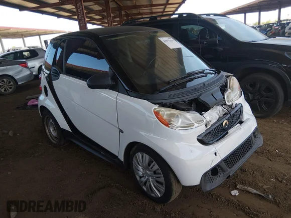 ✅ 2013 Smart fortwo Pure • VIN: WMEEJ3BA5DK607159 • Lot: 44971434. Listed on IAAI with 120,857 mi. Free auction sales archive from the USA and detailed vehicle history report at DreamBid. Image 1.