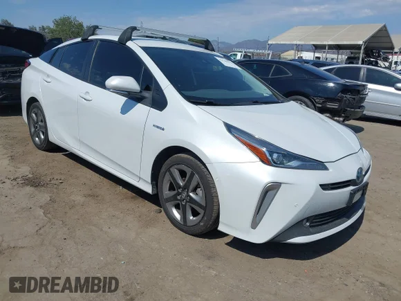 ✅ 2022 Toyota Prius L Eco • VIN: JTDKAMFU2N3177615 • Lot: 42769578. Listed on IAAI with 128,795 mi. Free auction sales archive from the USA and detailed vehicle history report at DreamBid. Image 1.