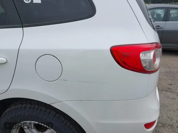 ✅ 2012 Hyundai Santa Fe GLS • VIN: 5XYZGDAB1CG151454 • Lot: 45165750. Wystawiony na IAAI z przebiegiem 197 755 mil. Bezpłatny archiwum sprzedaży aukcyjnych z USA i szczegółowy raport historii pojazdu na DreamBid. Zdjęcie 6.
