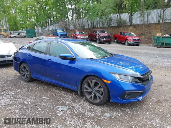 ✅ 2021 Honda Civic Sport • VIN: 2HGFC2F84MH516326 • Lot: 45179221. Wystawiony na IAAI z przebiegiem 54 417 mil. Bezpłatny archiwum sprzedaży aukcyjnych z USA i szczegółowy raport historii pojazdu na DreamBid. Zdjęcie 1.