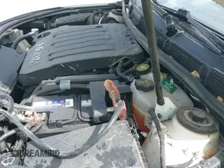 ✅ 2013 Buick LaCrosse Premium 2 • VIN: 1G4GH5E39DF129375 • Lot: 41741851. Wystawiony na IAAI z przebiegiem 124 404 mil. Bezpłatny archiwum sprzedaży aukcyjnych z USA i szczegółowy raport historii pojazdu na DreamBid. Zdjęcie 19.