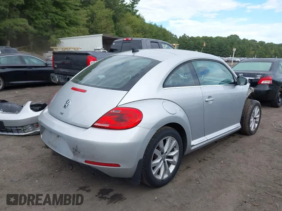 ✅ 2014 Volkswagen Beetle 2.0L TDI w/Sun/Sound/Nav • VIN: 3VWJL7AT4EM601359 • Lot: 43202231. Wystawiony na IAAI z przebiegiem 110 175 mil. Bezpłatny archiwum sprzedaży aukcyjnych z USA i szczegółowy raport historii pojazdu na DreamBid. Zdjęcie 4.