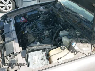 ✅ 1999 Buick Park Avenue • VIN: 1G4CW52K1X4623987 • Lot: 43083638. Wystawiony na IAAI z przebiegiem 129 010 mil. Bezpłatny archiwum sprzedaży aukcyjnych z USA i szczegółowy raport historii pojazdu na DreamBid. Zdjęcie 15.