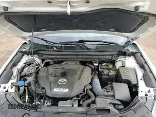 ✅ 2021 Mazda CX-5 Signature • VIN: JM3KFBEY2M0356013 • Lot: 66410025. Wystawiony na Copart z przebiegiem 47 279 mil. Bezpłatny archiwum sprzedaży aukcyjnych z USA i szczegółowy raport historii pojazdu na DreamBid. Zdjęcie 16.